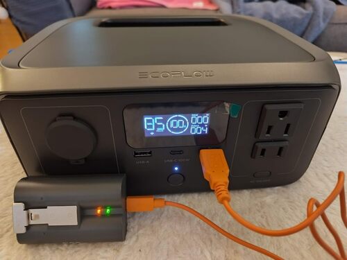 EcoFlow RIVER 3 powering USB devices with AC outlets, USB ports, and battery display visible