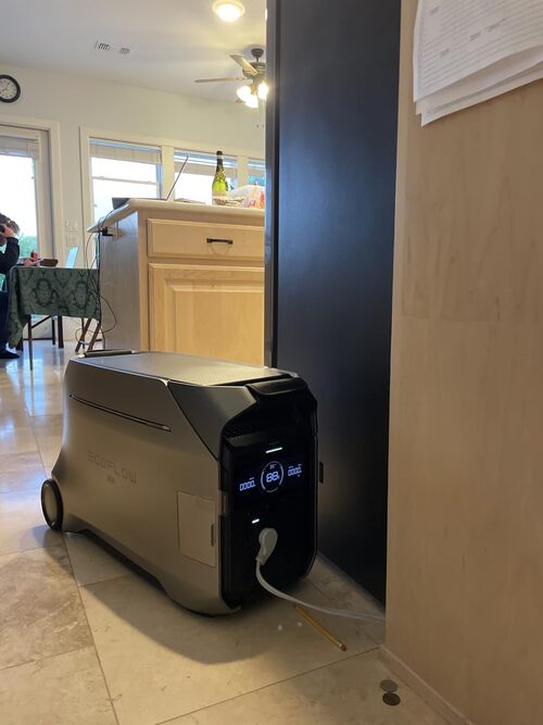 EcoFlow DELTA Pro 3 portable power station plugged in indoors during a home backup setup