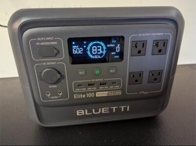 BLUETTI Elite 100 V2 portable power station showing front display, DC input, USB ports, and four AC outlets