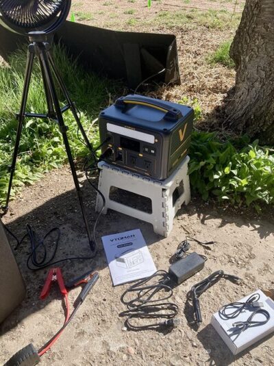 VTOMAN Jump 600X portable power station used outdoors with cables and accessories