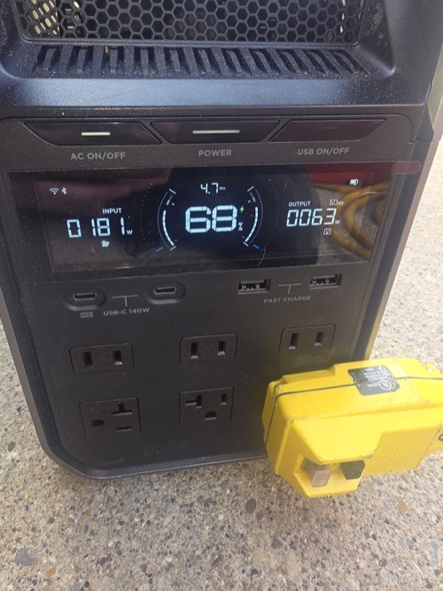 Power station display showing 181W solar input at 68% charge while connected to the ECO-WORTHY panel through a yellow XT60 adapter