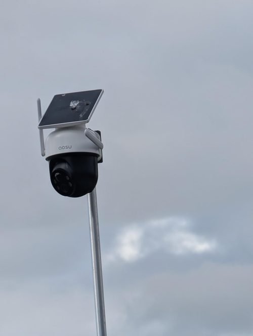 Customer pole-mounted AOSU C9C2 with debris visible on its solar panel